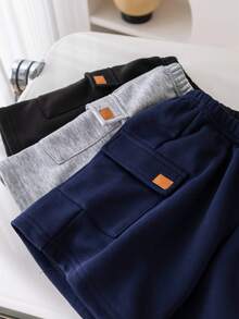 SHEIN 3入組男童休閒舒適針織短褲套裝，有口袋和徽章裝飾