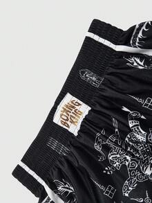 ROMWE MEN Prep Men's Letter & Dragon Goth Print Elastic Waist Loose Boxing Shorts, Halloween