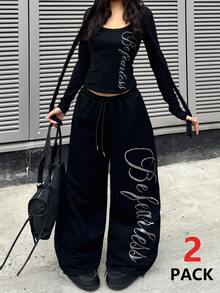 Coolane 两件套：黑色针织印花长袖上衣和抽绳裤 - 黑色 - 查看 1