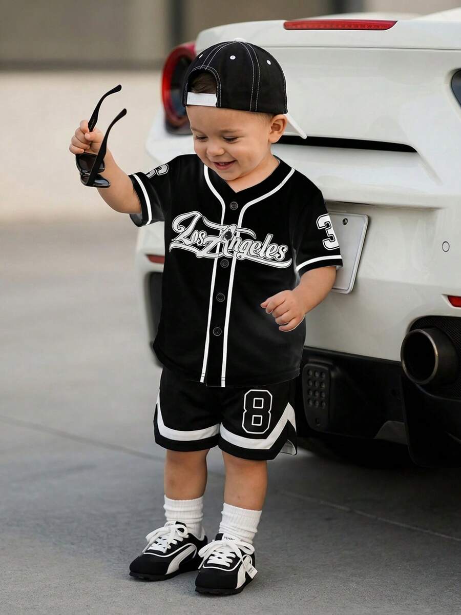 SHEIN Playful Pals Baby Boy Fashion Street Sports Baseball Jacket, Football Jersey, Basketball Jersey Style Jacket & Shorts Set, Baby Sports Outfit, Spring/Summer Set Baby Street Wear Baby Basketball Jersey Baby Boy Clothes Letterman Los Angeles Baby Boy Jersey Toddler Baseball Outfit - Black and White - View 1