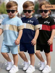 SHEIN Set de 2 piezas: Conjunto cómodo y lindo para niño pequeño: Camiseta de manga corta con bloqueo de color y estampado en inglés + Pantalones cortos a juego. Disponible en 3 opciones de color elegantes. Ideal para jugar, salir o uso diario - Tela cómoda, diseño fácil de poner y quitar, perfecto para los talla grande pequeños. - Multicolor - Ver 2
