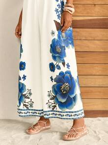 CAJUNI Combinaison à manches courtes et décolleté profond avec imprimé fleurs de bijoux