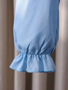 女童泡泡袖长袖衬衫，肩部饰有珍珠，配有可拆卸蝴蝶结，宽松版型，活力十足，面料舒适，适合搭配背带裙或作为内搭，春秋季穿着。 - 霧霾藍 - 查看 6