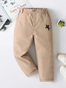 SHEIN بنطلون أطفال ذكور كاجوال أحادي اللون، مزين بزر واحد، جيوب مائلة، تصميم خصر مطاطي، مناسب للارتداء اليومي، السفر، الحفلات، العطلات، موضة متعددة الاستخدامات