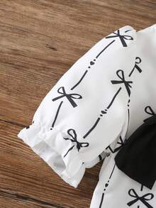 2pcs/Set, Young Girl Cute Minimalist Black Bowknot Print Bubble Sleeve Top & Bowknot Print Wide-Leg Pants Set - Fresh Summer Vacation Outfit, Perfect For Beach Trips, Travel & Summer Holidays - Black and White - View 5