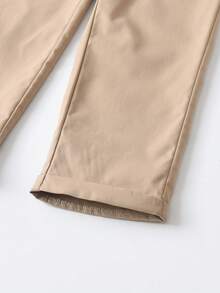 SHEIN بنطلون أطفال ذكور كاجوال أحادي اللون، مزين بزر واحد، جيوب مائلة، تصميم خصر مطاطي، مناسب للارتداء اليومي، السفر، الحفلات، العطلات، موضة متعددة الاستخدامات