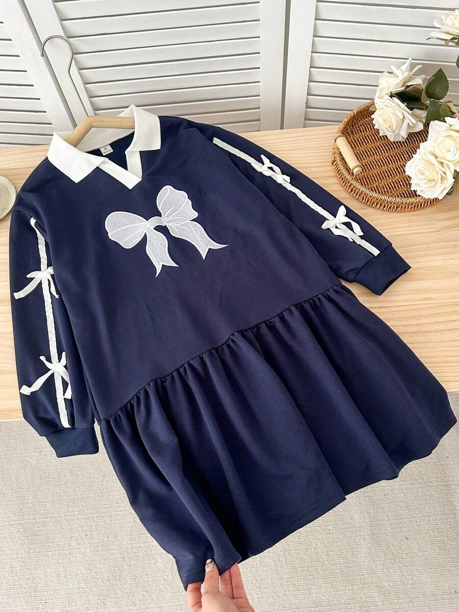 Genkimix Kids 女童超大蝴蝶结刺绣侧边缎带装饰V领喇叭连衣裙，休闲宽松卫衣裙，适合春季日常穿着 - 藏蓝色 - 查看 1