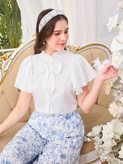 SHEIN Tween Girls' Elegant Solid Color Ruffle Sleeve Stand Collar Shirt With Bow Decor, Summer