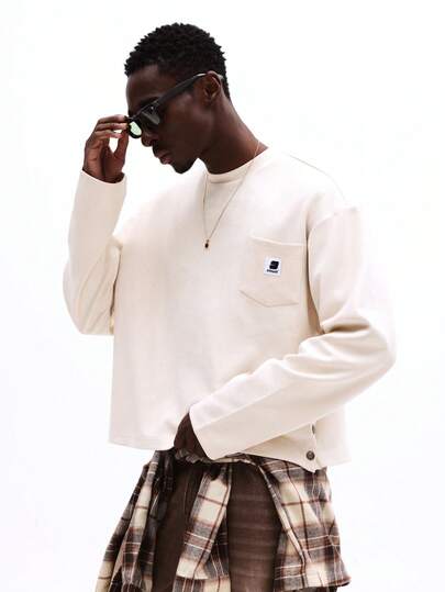 SUMWON Camiseta básica de manga larga con cuello redondo, bolsillo en el pecho y detalles de broches laterales, informal y sencilla