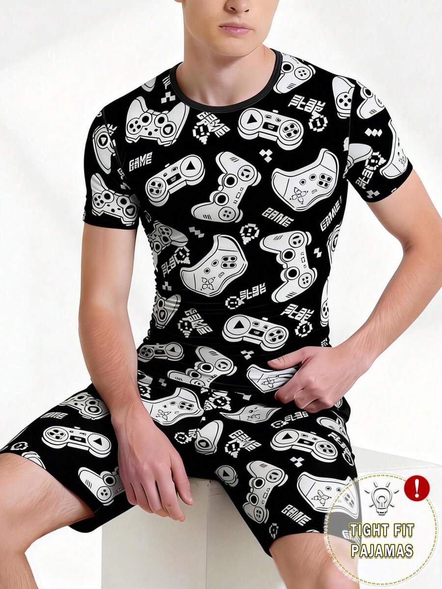 SHEIN 青少年男孩睡衣套装，黑色电子游戏印花弹力短袖上衣和短裤，舒适贴身家居服