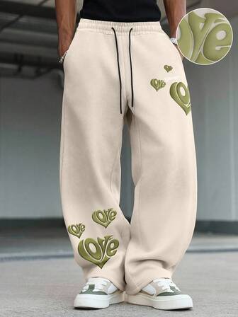 Pantaloni della tuta casual da uomo stile strada, con stampa a cuore e scritta in inglese, gamba dritta, adatti per autunno/inverno