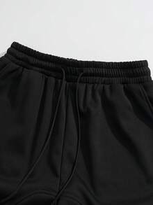 Manfinity Hypemode 男士条纹抽绳腰带口袋阔腿宽松休闲运动裤 男士运动裤 男士条纹运动裤 男士黑白裤 男士阔腿侧条纹健身裤 - 黑色 - 查看 4