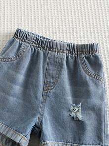 SHEIN Bộ 2 món: Áo thun ngắn tay in hình sao và trăng cùng quần short denim, thích hợp cho các dịp trang trọng, tiệc sinh nhật, lễ hội, dạ hội, biểu diễn, đám cưới, tiệc mừng em bé chào đời và lễ kỷ niệm sinh nhật lần thứ nhất. - Nhiều màu - Xem 12