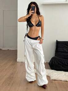 Coolane Women's Black Halter Micro Crop Top: Rhinestone Knitted Camisole With Asymmetrical Hem For A Dazzling Night Out - Black - View 5