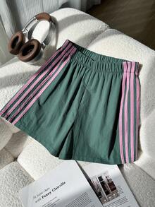 SHEIN Quần short thể thao kẻ sọc Zhongda Tong dành cho bé gái, quần short mùa hè dáng rộng thoải mái, thắt lưng co giãn, kẻ sọc bên hông, thời trang và đa năng, quần short rộng rãi, co giãn và thoải mái cho trẻ em, thích hợp cho mùa ấm áp, quần short suông. - màu xanh lá - Xem 3