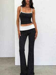 SHEIN EZwear Bộ đồ hè phối màu chấm bi mới năm 2026, gồm áo hai dây và quần phối màu chấm bi, thích hợp cho các hoạt động mùa xuân/hè. Áo hai dây chấm bi, áo hai dây chấm bi ngọt ngào, áo hai dây phối chấm bi đen trắng. - Nhiều màu - Xem 7