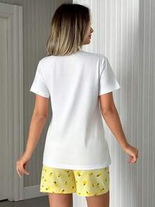 EURMUSE Conjunto de pijama feminino plus size de 2 peças em algodão com estampa de abacaxi: blusa de manga curta com gola redonda e shorts com estampa de abacaxi em cor contrastante. Ideal para usar em casa. - Multicolorido - Ver 2