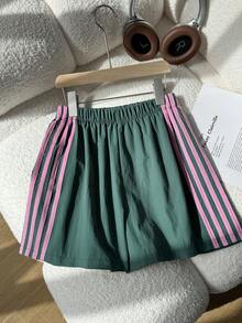 SHEIN Quần short thể thao kẻ sọc Zhongda Tong dành cho bé gái, quần short mùa hè dáng rộng thoải mái, thắt lưng co giãn, kẻ sọc bên hông, thời trang và đa năng, quần short rộng rãi, co giãn và thoải mái cho trẻ em, thích hợp cho mùa ấm áp, quần short suông. - màu xanh lá - Xem 7