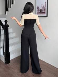 Set de 2 piezas de top de manga corta con nudo delantero y pantalones de color contrastante para mujer - Negro - Ver 7