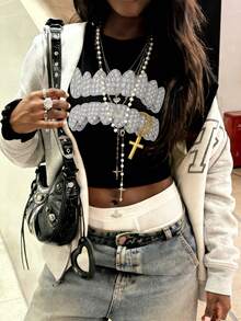 Rovax Women's Cross Print Round Neck Short Sleeve Cropped Fitted Fashion T-Shirt - Black - View 1