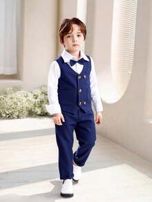SHEIN Traje de 2 piezas para niños de 4 a 7 años para volver al colegio: chaleco sin mangas de tejido texturizado en rojo navideño y pantalones a cuadros de tejido texturizado, conjunto formal elegante para ocasiones como fiestas, cumpleaños, festividades en primavera, otoño e invierno - azul real - Ver 1