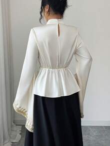 Elenzga Camisa elegante de mujer con mangas acampanadas, bordada con encaje floral 3D y lentejuelas en la cintura, para la temporada de principios de primavera - Albaricoque - Ver 2