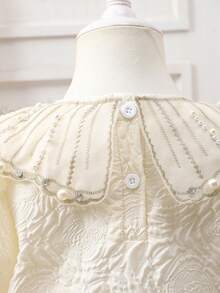 Đầm bé gái mùa xuân/hè/thu thanh lịch, tối giản, chất liệu vải dệt nổi, màu mơ, cổ áo thêu ngọc trai và đá pha lê, tay phồng, thích hợp cho mùa xuân/hè, kiểu dáng tối giản, thanh lịch, duyên dáng, phù hợp cho đi học, dã ngoại, kỳ nghỉ, tiệc tùng, lễ hội. - Màu be - Xem 7