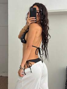 Coolane Women's Black Halter Micro Crop Top: Rhinestone Knitted Camisole With Asymmetrical Hem For A Dazzling Night Out - Black - View 4