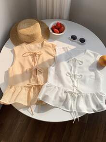 CovetEZ Women's Round Neck Tie Front Ruffle Hem Sleeveless Blouse - Yellow - View 1