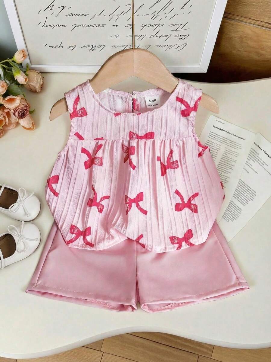 SHEIN 女婴白色纯色提花纹理面料圆领无袖露脐褶皱背心，饰以彩色波点印花，搭配粉色弹力腰舒适简约短裤，休闲度假装扮，春夏皆宜。 - 粉色 - 查看 1