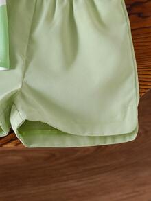 2 pièces Tenue d'été pour bébé fille, Top blanc à pois avec manches bouffantes et décoration nœud bicolore, assorti avec un short à taille élastique vert clair. Palette de couleurs douces, vivante et adorable pour le port d'été des bébés filles. - Multicolore - Voir 3