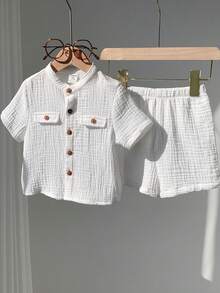 SHEIN Bộ 2 món áo sơ mi ngắn tay và quần short màu trắng mềm mại, 100% cotton, dành cho cả bé trai và bé gái, thích hợp cho mùa xuân/hè. - trắng - Xem 7