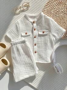 SHEIN Bộ 2 món áo sơ mi ngắn tay và quần short màu trắng mềm mại, 100% cotton, dành cho cả bé trai và bé gái, thích hợp cho mùa xuân/hè. - trắng - Xem 4
