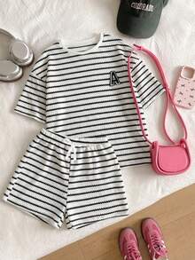 SHEIN Bộ áo thun tay ngắn cổ tròn kẻ sọc dáng rộng, tối giản, thoải mái cho bé gái tuổi teen. - Đen và trắng - Xem 4