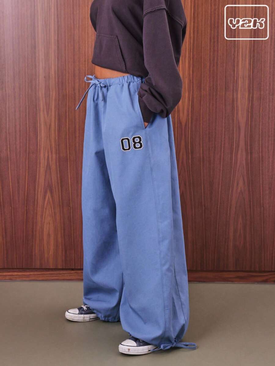 COUREZ Quần ống rộng cạp thấp kiểu quần dù với họa tiết sinh viên / Trang phục đi chơi phong cách Y2K mùa thu, quần áo nữ mùa thu, quần áo mùa đông, quần ống rộng đi học. - Màu xanh lam - Xem 1