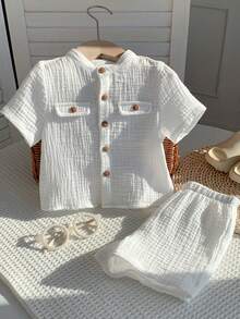 SHEIN Bộ 2 món áo sơ mi ngắn tay và quần short màu trắng mềm mại, 100% cotton, dành cho cả bé trai và bé gái, thích hợp cho mùa xuân/hè. - trắng - Xem 5