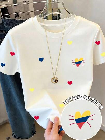 Resyla Camiseta informal con manga corta y estampado de corazón para mujer, talla estándar