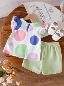 2 pièces Tenue d'été pour bébé fille, Top blanc à pois avec manches bouffantes et décoration nœud bicolore, assorti avec un short à taille élastique vert clair. Palette de couleurs douces, vivante et adorable pour le port d'été des bébés filles. - Multicolore - Voir 2