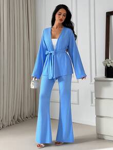 EURMUSE Textured Two Pieces Set, Wrap Blouse With Belt Detail, Flared Pants, Relaxed Fit, Soft Drape Fabric, Effortless Chic Style - Baby Blue - View 3