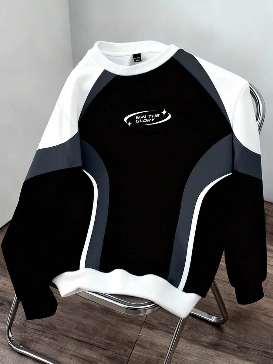 Manfinity Joysei 男士撞色印花套头卫衣，适合秋冬季节、户外活动和上学穿着。