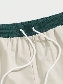 ROMWE MEN Prep Pantalones cortos casuales sueltos con cordón en la cintura y bolsillos para hombres - Caqui - Ver 4