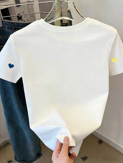 Resyla Camiseta informal con manga corta y estampado de corazón para mujer, talla estándar