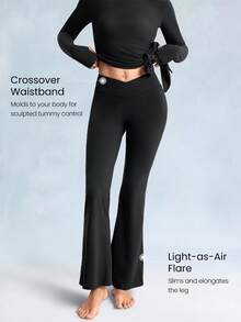 GLOWMODE Quần tập yoga FeatherFit™ 31" ống loe rộng, cạp chun chéo, túi bên hông, thích hợp cho hoạt động hàng ngày, ngoài trời, tập luyện trong phòng tập. - màu đen - Xem 4