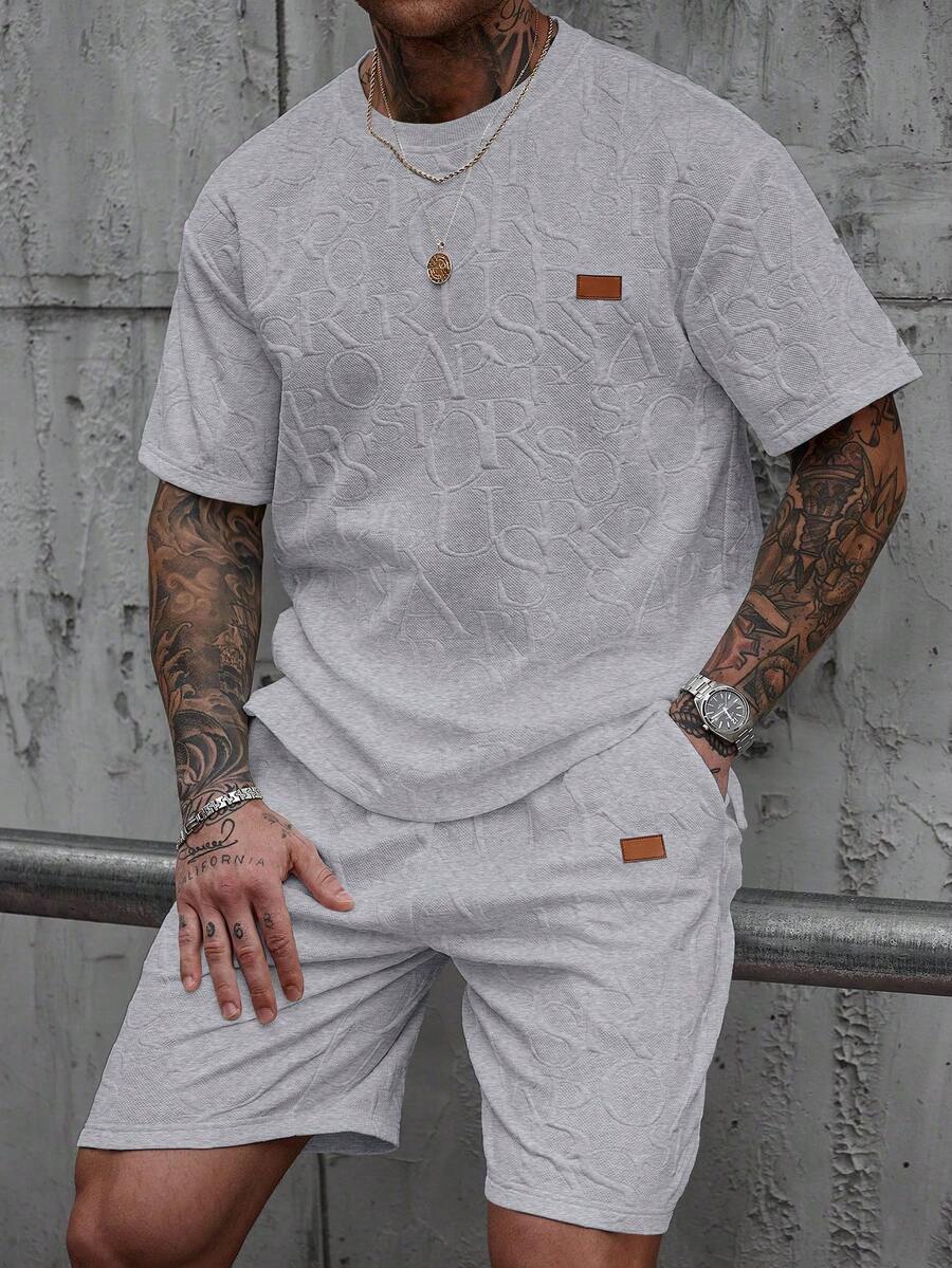 Manfinity CasualCool Men's Casual Letter Embossed Patch Detail Short Sleeve T-Shirt And Shorts Set, Summer Casual Two Piece Set Men Mens 2 Piece Outfits Men Summer Sweatsuit Men T Shirt Co Ords Men Two Piece Set Summer - Light Grey - View 1