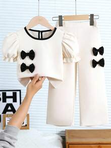 SHEIN Casuvi Kids 女童两件套 - 纯色梭织泡泡袖短袖上衣，撞色水滴领和蝴蝶结装饰，搭配宽松直筒裤，法式时尚风格，适合春夏休闲穿着 - 彩色 - 查看 3