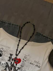 SHEIN EZwear Women's Oversized Asymmetrical Cold Shoulder Ruffle Hem Long Sleeve T-Shirt - Vintage Statue Of Liberty Newspaper Graphic Print Retro Y2K Punk Goth Grunge Streetwear Top For All Seasons, Back To School, Hip-Hop, And Club Outfits Long Sleeve Graphic Tshirt