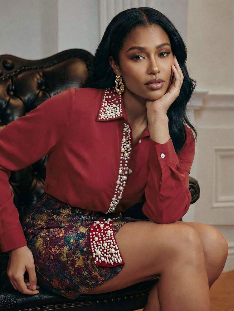 Women's Elegant And Luxurious Two Pieces Set In Burgundy For Autumn/Winter, Featuring A Long Sleeve Button-Up Shirt And A Pleated Mini Skirt With Jacquard Shimmer Fabric. The Shirt Collar, Placket, And Skirt Front Are Embellished With Pearl Beads And Rhinestones, Suitable For New Year, Parties, Christmas, Weddings, And Other Occasions.