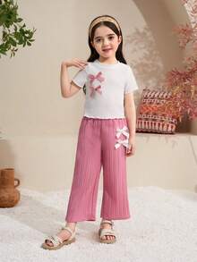 Elladie kids 两件套，包括带有3D蝴蝶结装饰的纹理面料T恤和休闲裤，非常适合居家或户外休闲穿着。女童裤装套装，年轻女孩服装套装，短袖套装，喇叭裤套装，可爱套装，年轻女孩休闲夏季两件套，两件套，年轻女孩可爱复古风格两件套，年轻女孩百褶裤套装，两件套，百褶裙套装。 - 粉色 - 查看 8