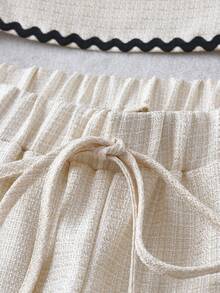 GlowEve CURVE Bộ 3 món dành cho nữ cỡ lớn, trang phục đi làm và đi học thanh lịch, thường ngày: Áo khoác cardigan tay ngắn phối màu viền sóng, áo hai dây lửng và quần short ống đứng. - Màu be - Xem 6