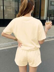 Bộ 2 món màu trắng kem in họa tiết da báo retro số 67 dành cho bé gái tuổi teen, kiểu dáng tối giản, áo thun ngắn tay và quần short, thích hợp cho mùa hè, phong cách thể thao thường ngày ở trường, dã ngoại, đi chơi, chụp ảnh đường phố, ở nhà. - Nhiều màu - Xem 2